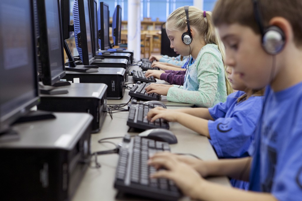 Students using typing program in the classroom.